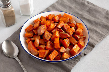 Homemade Roasted Sweet Potatoes on a Plate, side view.