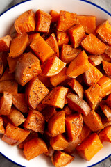 Homemade Roasted Sweet Potatoes on a Plate, top view. Overhead, from above.