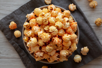 Homemade Crunchy Chicago-Style Popcorn with Caramel and Cheese in a Bowl, top view.