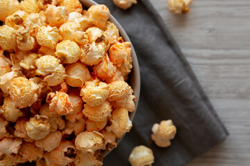 Homemade Crunchy Chicago-Style Popcorn with Caramel and Cheese in a Bowl, top view.