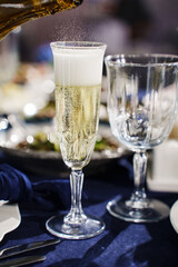 bubbles in a glass of champagne. Sparkling wine.