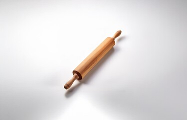 A wooden rolling pin lies on a white background.