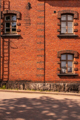 old brick wall with windows
