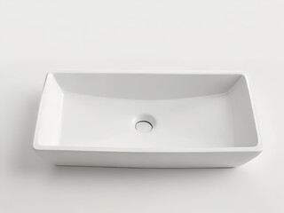Studio photo of a white ceramic sink on a white background