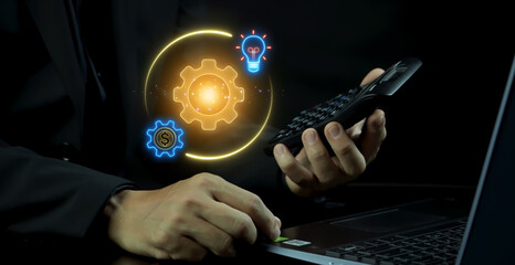 Business concept, an organization or enterprising entity engaged in commercial, industrial, or professional activities. Businessman shows glowing neon line of Business icon on virtual screen.