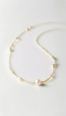 Close-up of an elegant pearl necklace or bracelet with a delicate gold chain placed on a soft, blurred background. Perfect for weddings, fashion, and luxury accessories.