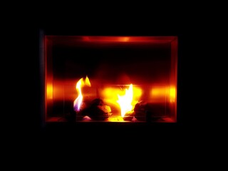 Naklejka premium fire in fireplace