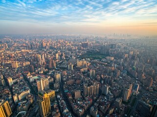 Fototapeta premium Aerial view of a bustling metropolitan city skyline at sunset