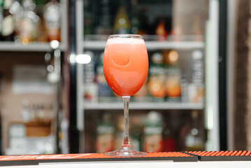 strawberry cocktail on bar counter in bar, nightlife concept