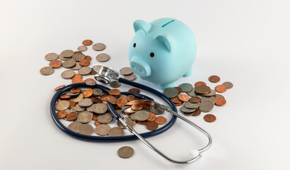 Stethoscope and a pile of US coins of various denominations
