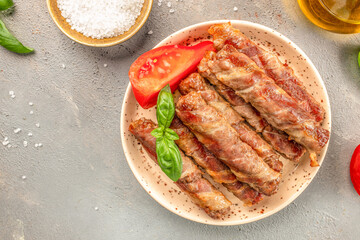 Stuffed Bacon Rolls. minced meat in bacon rolls. Food recipe place for text, top view