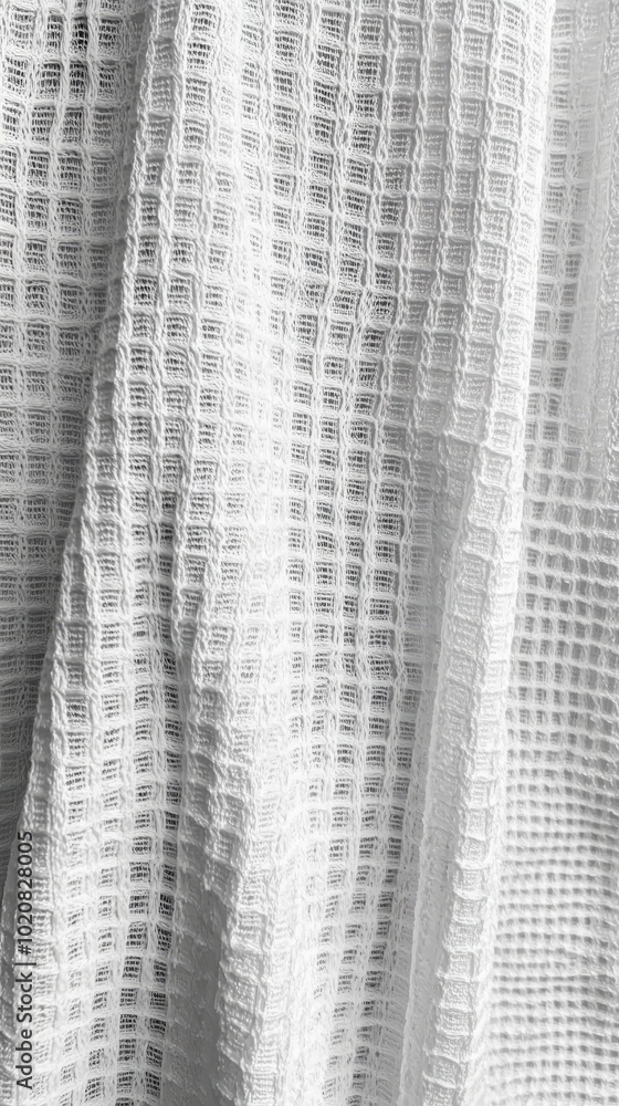 Poster close-up of delicate white textured fabric showcasing a grid pattern.