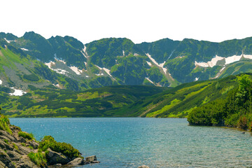 Mountain lake in Five Polish Ponds Valley. Beautiful summer landscape in the mountains. Isolated object.