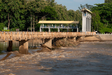 Debris from the violent flash floods stuck to the bridge.