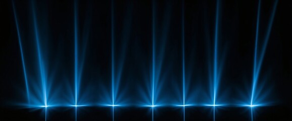 A series of blue lights are lined up in a row. The lights are evenly spaced and are shining brightly