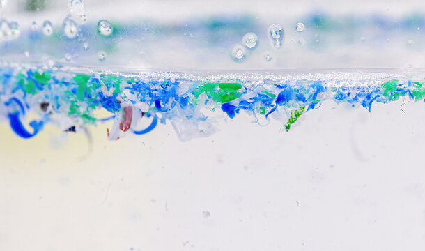 Becker cup with polluted water, contaminated