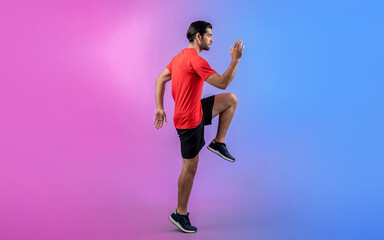 Full body length gaiety shot athletic and sporty young man fitness running cardio exercise posture on isolated background. Healthy active and body care lifestyle.