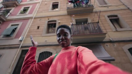 African American woman smiles making video call to family, enjoying seamless 6G internet in Barcelona’s historic old town. Black female connects with loved ones from vibrant Mediterranean city
- Powered by Adobe