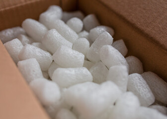 open box with packing 'peanuts' inside on the white background