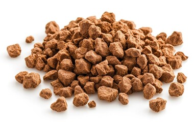 Brown rock salt chunks piled on a white surface with a natural texture, showcasing their unique shape and color