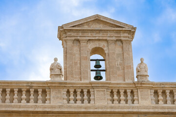 Fragment of the facade of the Cathedral Maria Santissima della Madia (Basilica Cattedrale Maria Santissima della Madia) in old town Monopoli, Puglia, Italy 