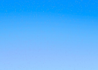 Snowfall on the background of the gradient sky. Winter background with snow. Morning snowfall.