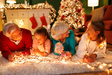Children spending New Year's Eve at home with grandparents