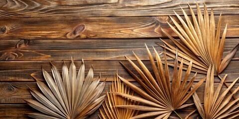 Dried Palm Leaves on a Wooden Background