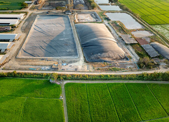 Covered lagoon digester for biogas production from poultry farm..