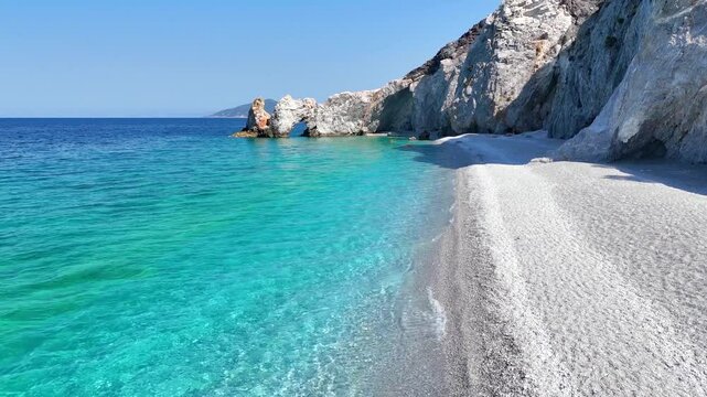 Aerial view of the beautiful beach of Lalaria, Skiathos island, Sporades, Greece, with turquoise, shining sea and without people