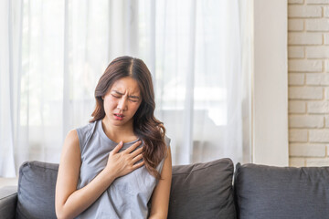 Sick asian women touching neck unwell coughing with sore throat pain,lung cancer,bronchitis,Bronchial Asthma,Tuberculosis,pneumonia,covid-19,eco air pollution pm2.5.insurance and hospital
