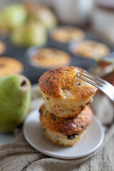 Banana chocolate chip muffins on a baking rack