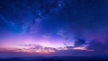 Naklejka premium Starry sky over mountains