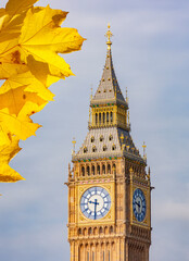 Obraz premium Big Ben tower of Houses of Parliament in autumn, London, UK
