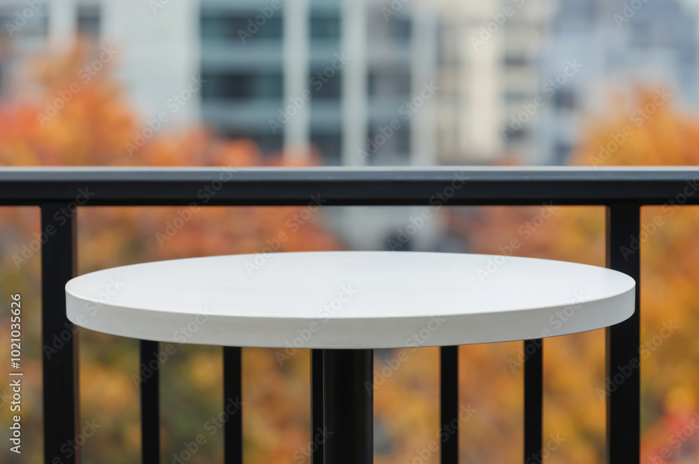 Aufkleber empty round white table on a balcony overlooking autumn trees
