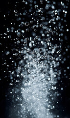 Fototapeta premium Dynamic Water Droplets Isolated on Black Background – High-Speed Captures, Ripples, Splashes, and Mist in Elegant Motion