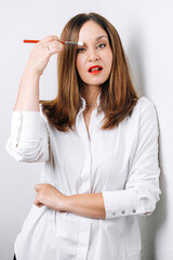 portrait of makeup artist on white background