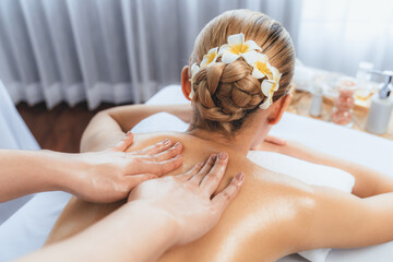 Caucasian woman customer enjoying relaxing anti-stress spa massage and pampering with beauty skin...