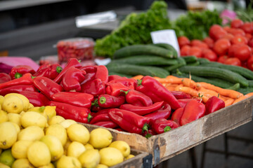 Fresh vegetables displayed on a farmer's market counter