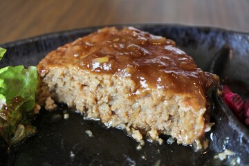 Hamburg steak with Shalyapin sauce (onion and garlic sauce) in Tokyo, Japan