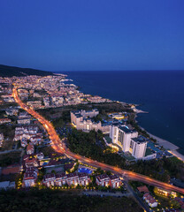 Fototapeta premium Aerial view to a sea resort Sunny Beach on Black sea, Bulgaria at night