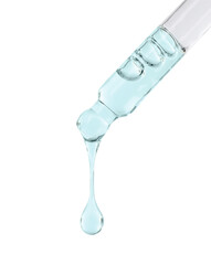 Cosmetic oil dripping from pipette on white background, closeup