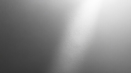 A subtle gradient of soft gray shades creating a serene and minimalistic abstract background.