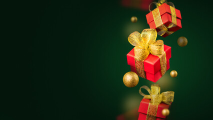 Levitation of Red Christmas gift boxes with golden balls on a green background. New Year's gift concept. Copy space banner