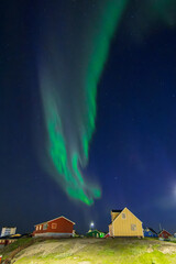 Northern lights in the town of Narsaq (South Greenland) © julen