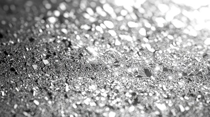 A dazzling close-up of sparkling silver glitter, creating a festive and vibrant atmosphere.