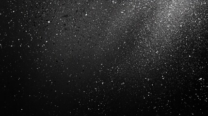 Obraz premium A mesmerizing abstract image featuring a myriad of white particles against a dark background, creating a sense of depth and motion.