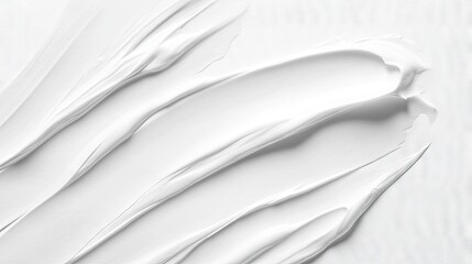 A smooth, thick white paint texture with soft ridges and creases on a white canvas.