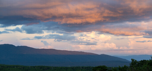 Amazing colorful sunrise over the rainforest mountains with fog and mist at Ob Luang natinoal park, Chiangmai, Thailand