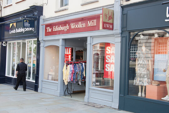 The Edinburgh Woollen Mill shop on the High Street in Colchester, Essex in the UK